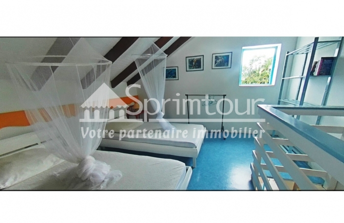 DESHAIES - BUNGALOW T2 no3 - 55 m2 + jardin 256 m2 - Piscine - Vue mer -Belle plage de sable à 150 m -