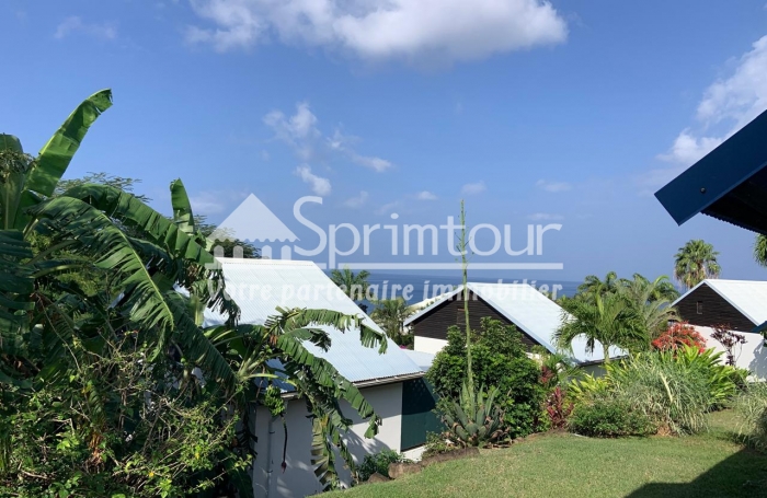 Exceptionnel une maison 55 m2 à la vente à DESHAIES- Vue mer - Belle plage de sable fin à 150 m.