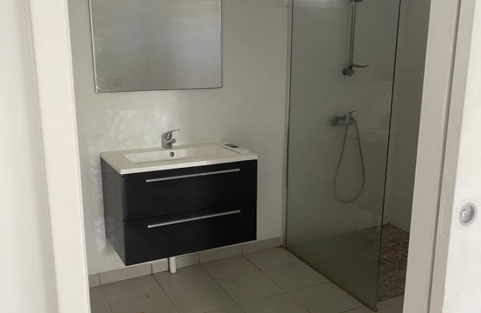 T4  en duplex avec jardinet.